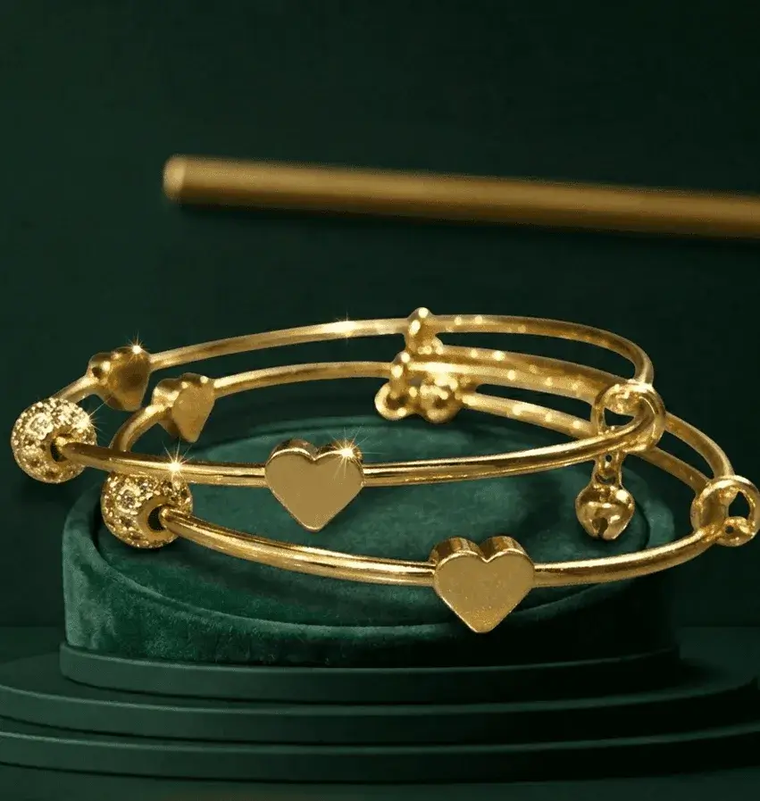 Nakhry_Bangles_Twin-Hearts-Glitz-Bangles (1) Twin Hearts Gold Bangles for Women with Crystal Detailing and Bell Charms