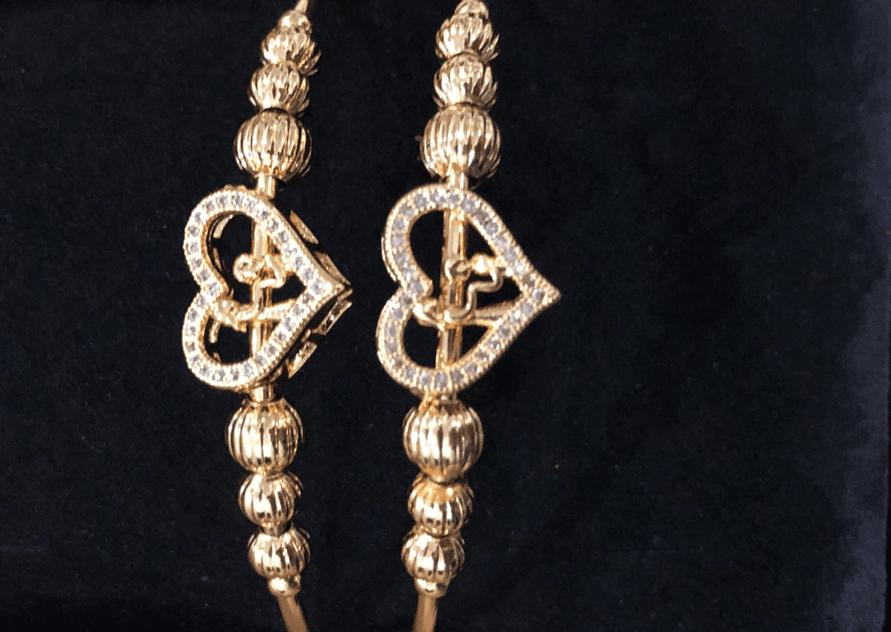 Nakhry_Bangles_pair of gold heart and bells Nakhry_Bangles_pair of gold heart and bells