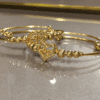 Nakhry_Bangles_pair of gold heart and_bells_