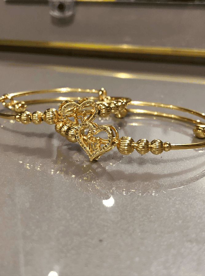 Nakhry_Bangles_pair of gold heart and_bells_ Nakhry_Bangles_pair of gold heart and_bells_